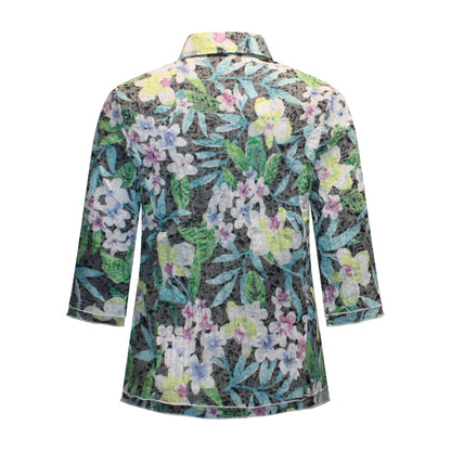 Achterzijde van Navigazione blouse Simone met driekwart mouwen en patroon in groen.